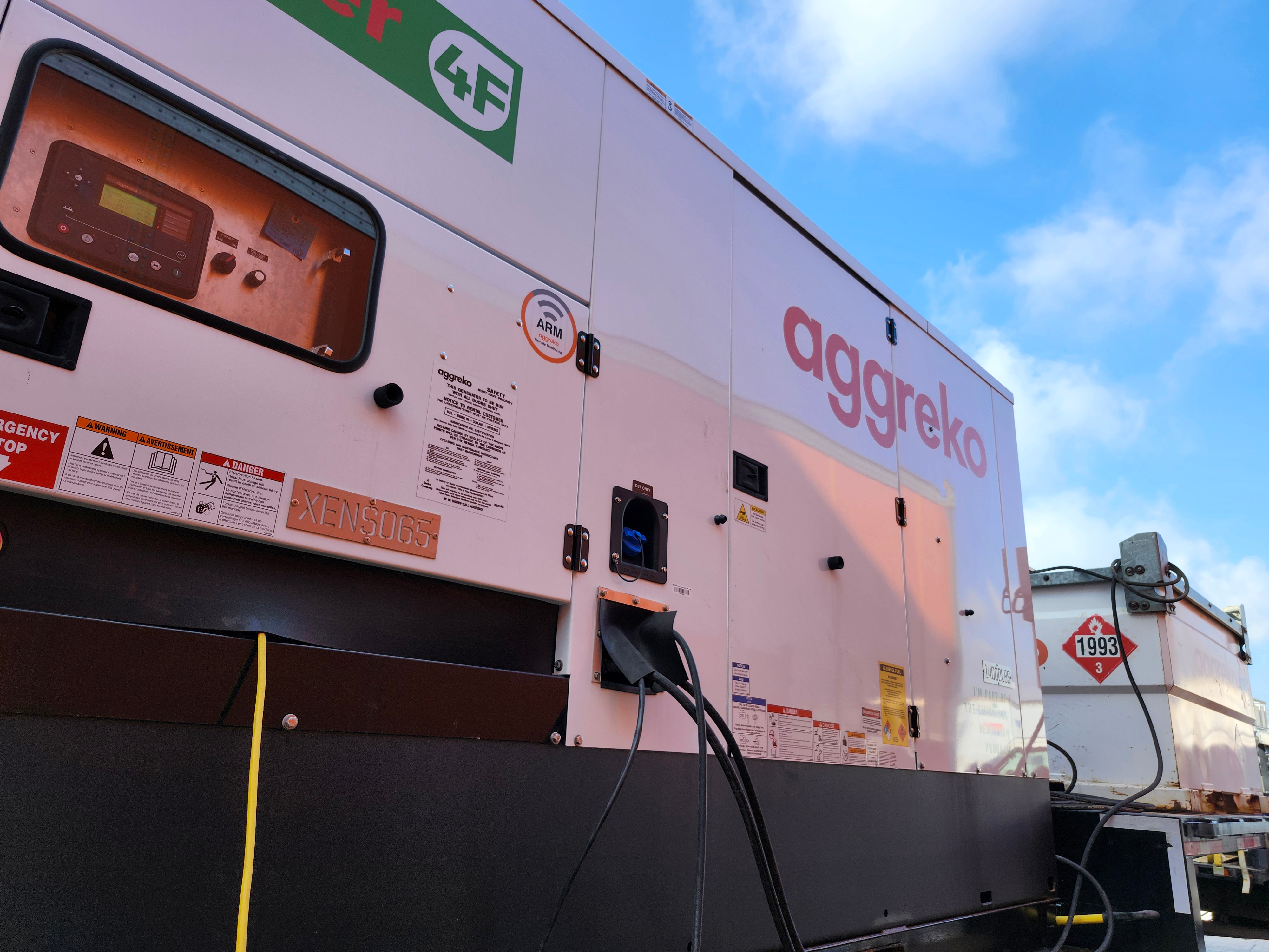 large generator being fueled by diesel